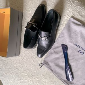 Corrente black leather loafers with bit style buckle.
